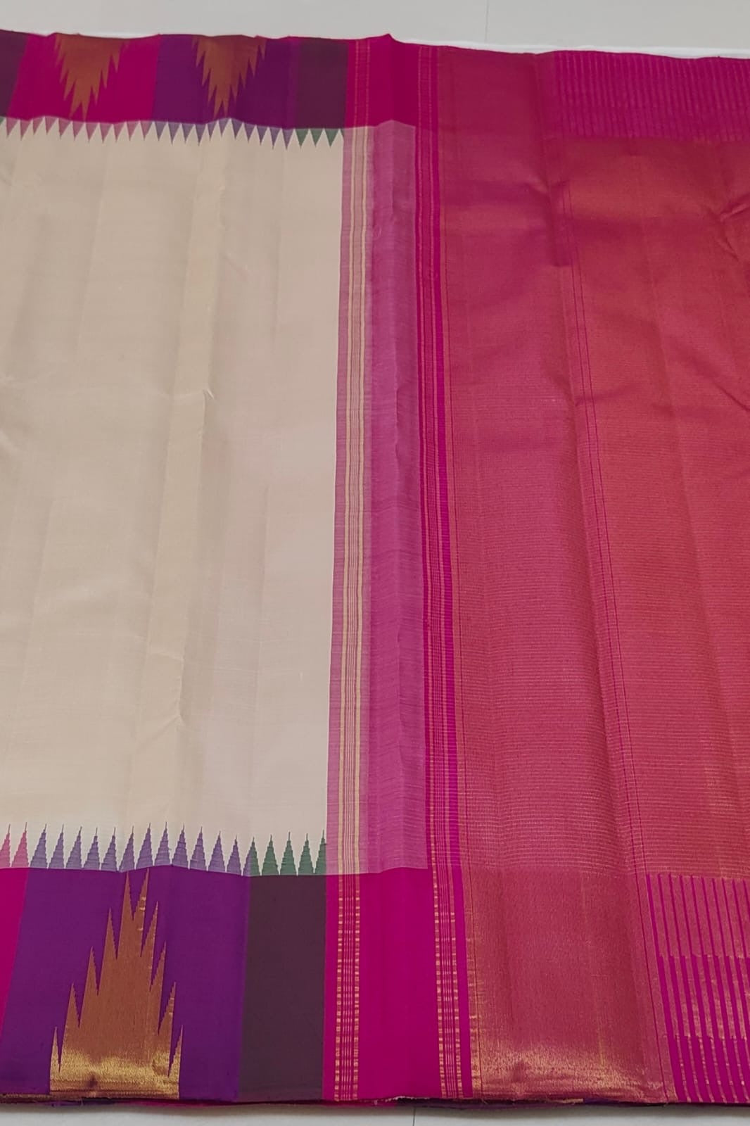 Ivory beige Pure Silk Kanjeevaram saree with temple-inspired border