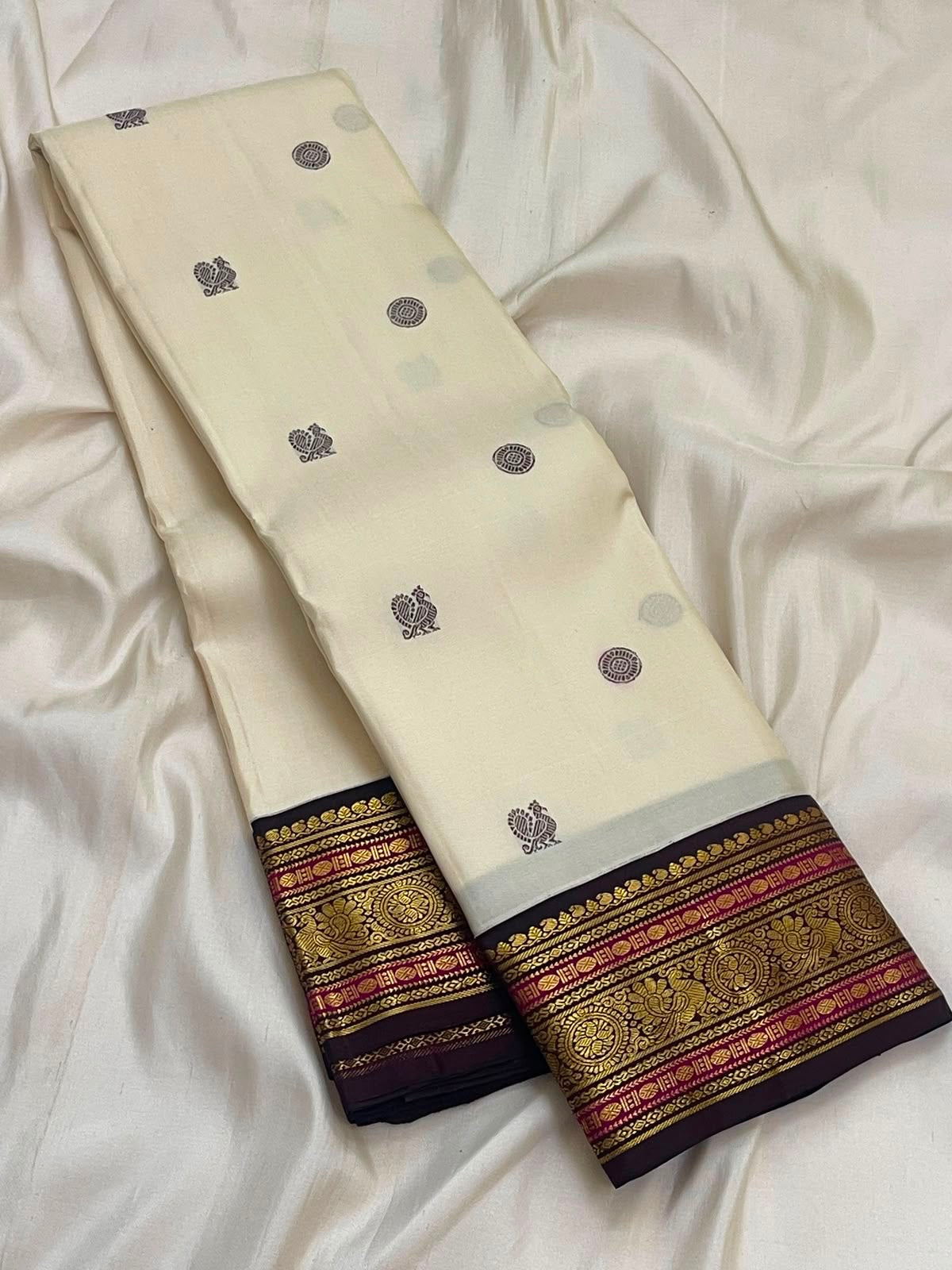 Warm Ivory Pure Silk Kanchipuram Saree | Butta | Aubergine Zari Border