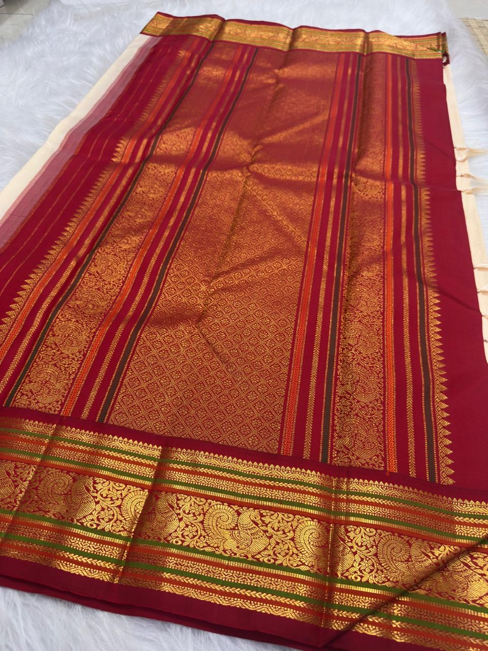 Warm Ivory Handwoven Pure Silk Kanchipuram Saree with Deep Crimson Varisaipet Border