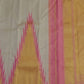 Ettukol weave depth detail — raised layered texture on ivory pure mulberry silk body