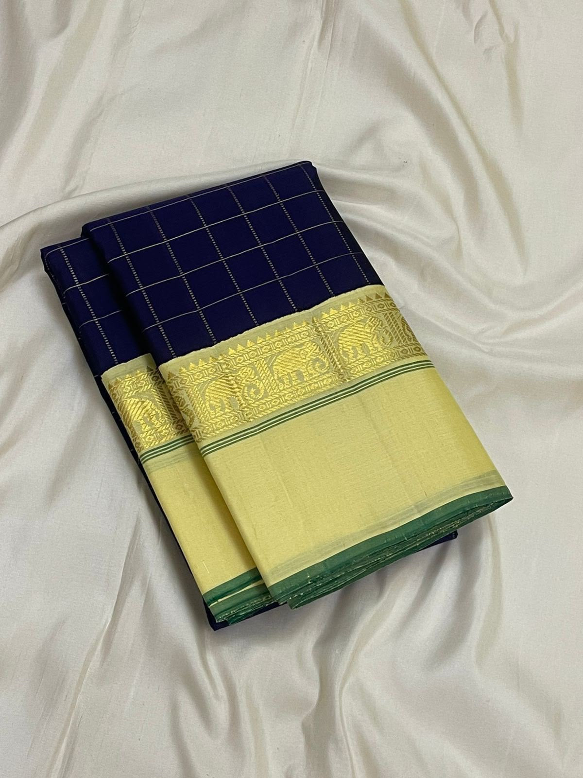Neelam Blue Handwoven Pure Silk KanchiPattu Kanchi Kattam Saree with Kaal Irangiya Ivory Gold Border