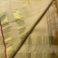 Handwoven Ivory Pure Silk Kanchipuram Rettapet saree.