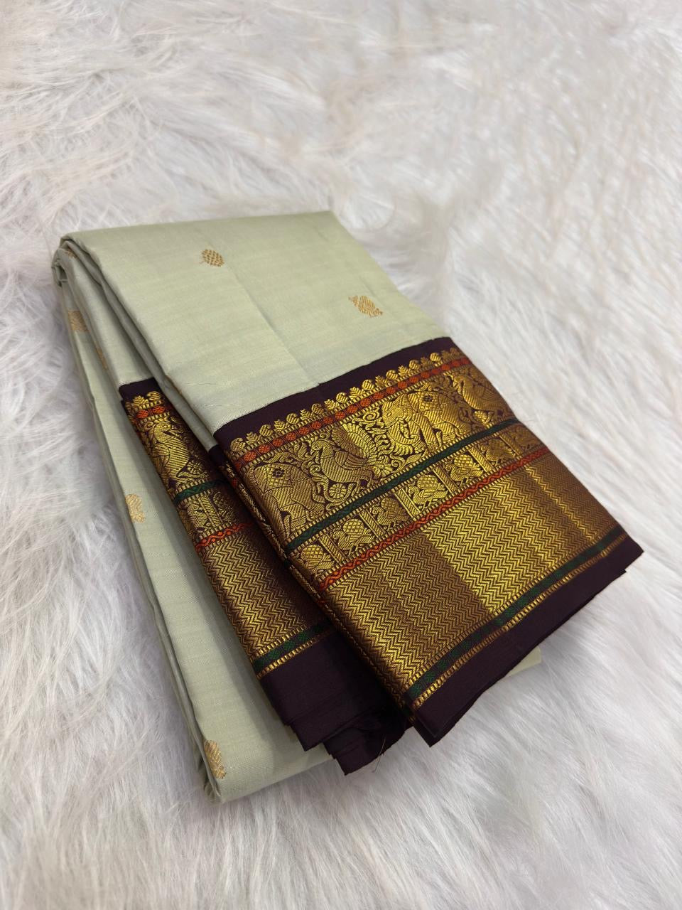 Ivory Green Undertone Handwoven Pure Silk Kanjipuram Saree with Aubergine Korvai Mayil Zari Border