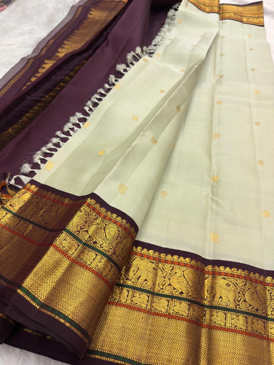 Ivory Green Undertone Handwoven Pure Silk Kanjipuram Saree with Aubergine Korvai Mayil Zari Border