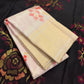 Pearl Ivory Kanchipuram saree with layered rose coral and sage botanical zari work.