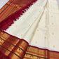 Soft ivory handwoven silk body with deliberately spaced zari motifs