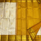 Venpattu Ivory Pure Silk Kanchipuram Butta Saree with Manjal Gold Pettu