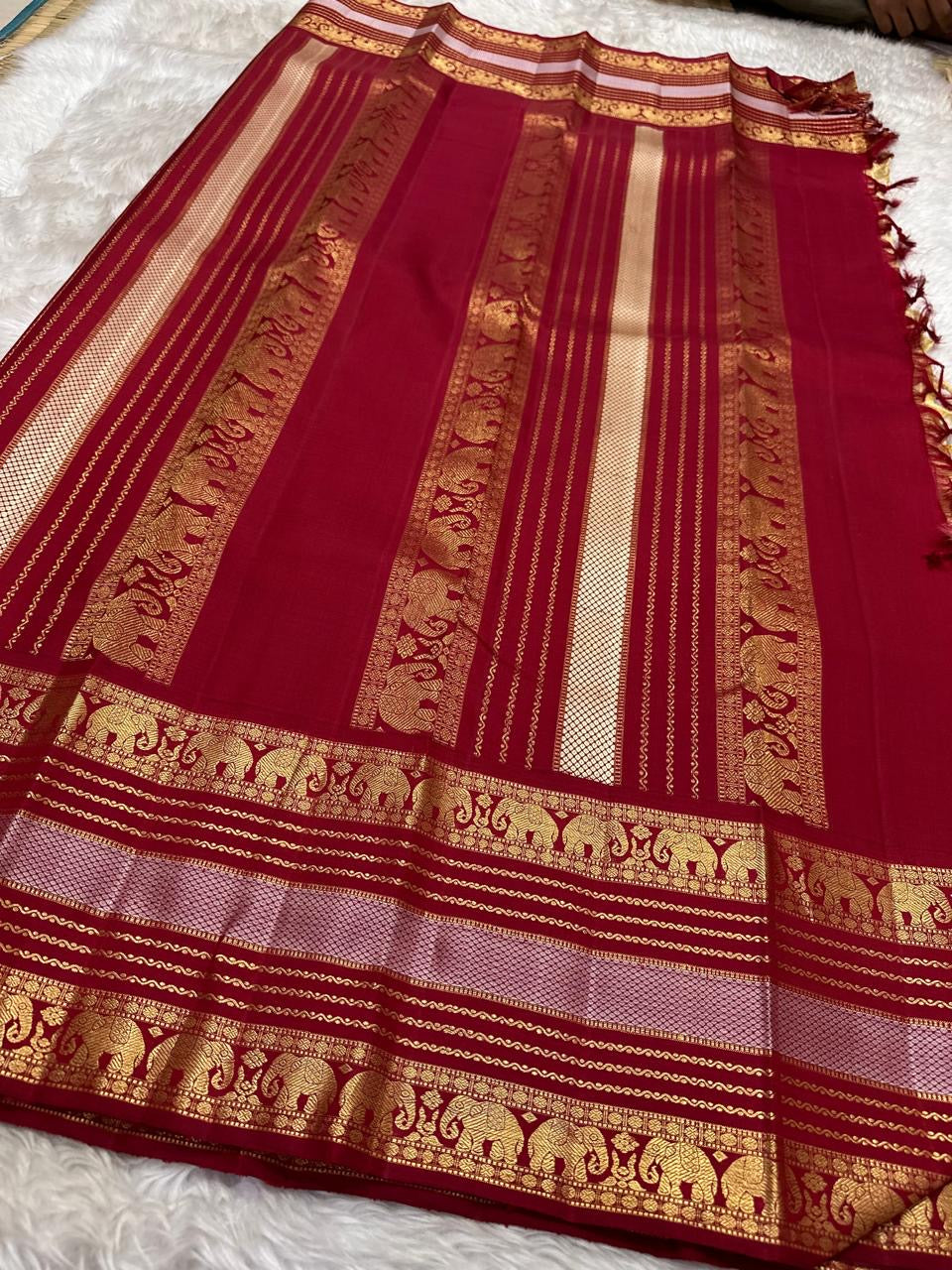Ivory Kanchipuram Korvai silk saree, traditional zari motifs on the grand pallu