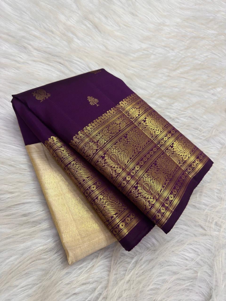 Ivory tissue Kanjivaram saree with violet zari border