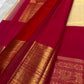 Soft ivory KanchiPattu saree — antique-gold zari peacock border motif close-up