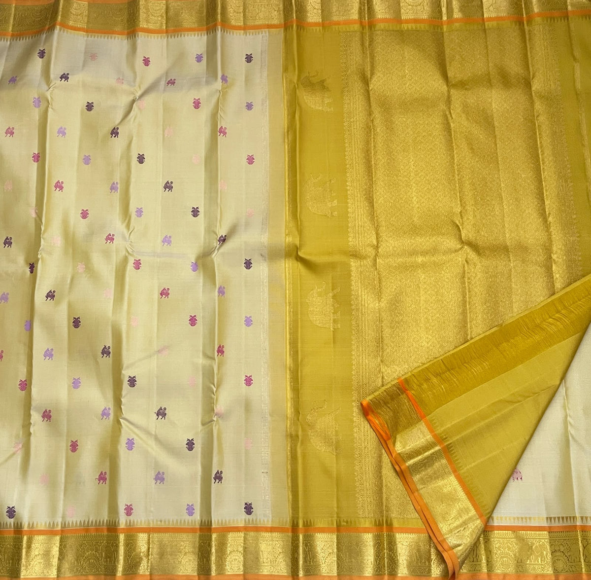 Ivory Kanchipuram silk saree with silk-thread Butta motifs