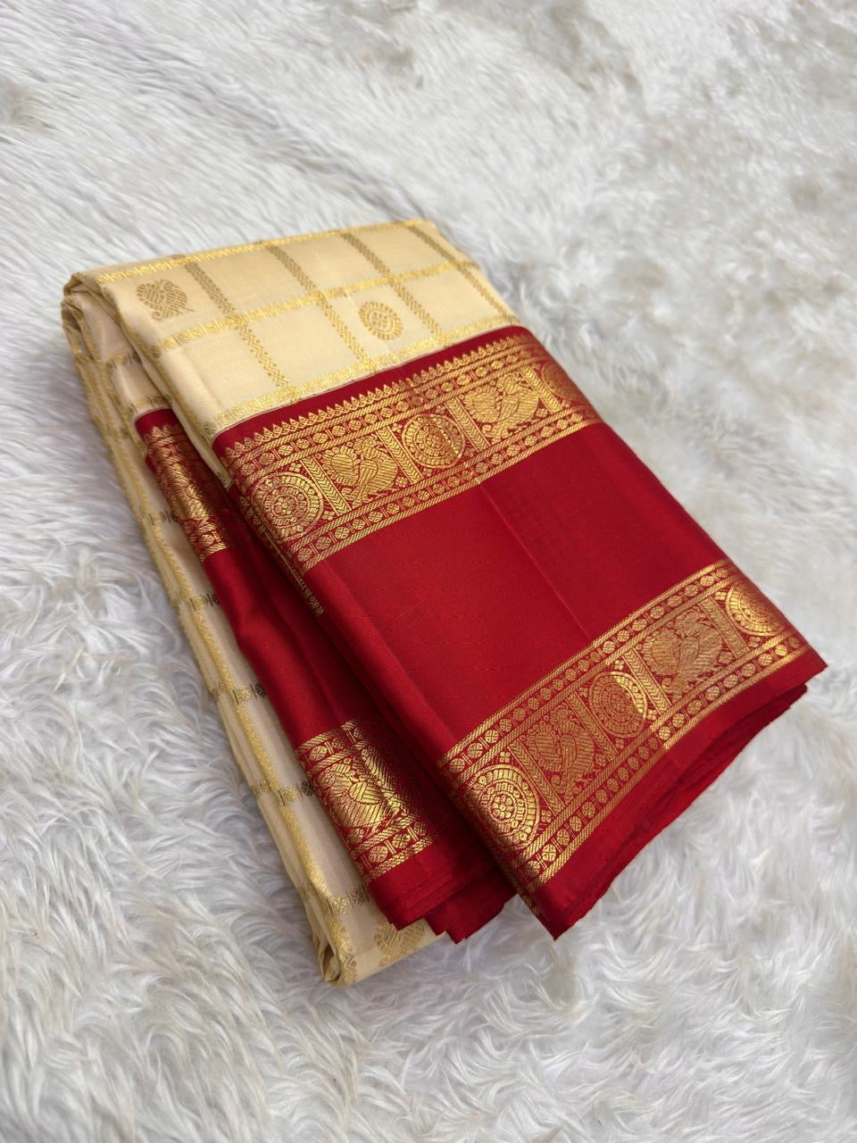 Warm Ivory Handwoven Pure Silk Kanjipuram Saree with Zari Kattam and Pillar-Box Red Border