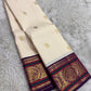 Ivory Kanjipuram pure silk saree with lightweight Korvai and deep purple border — Idam Living