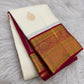 Full view of ivory Varisaipet Kanjipuram silk with Arakku red Mughal floral zari border