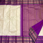 Warm Ivory Kanjivaram saree with intricate Royal Purple traditional zari border
