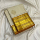 Venpattu Ivory Pure Silk Kanchipuram Butta Saree with Manjal Gold Pettu