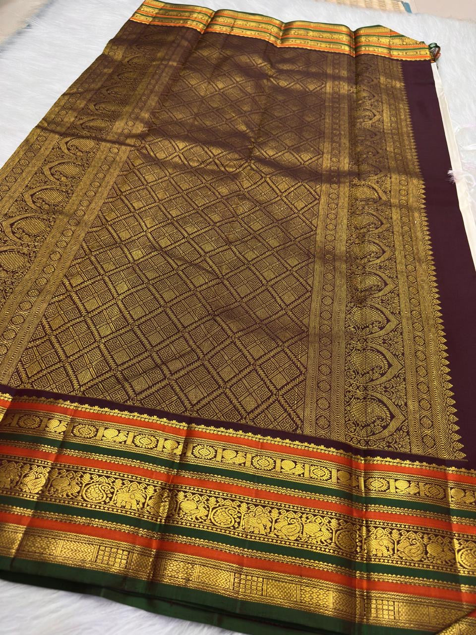 Kancheepuram handwoven varisaipet saree in ivory, woven for Idam Living in Kunnam village