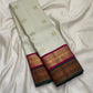 Sandalwood Ivory Handwoven Pure Silk Kanjivaram Korvai Saree with Peacock and Elephant Motifs, folded saree presentation