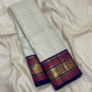 Warm Ivory Handwoven Pure Silk Kanchipuram Saree with Purple Border and Veldhari Detail, contrasting border detail