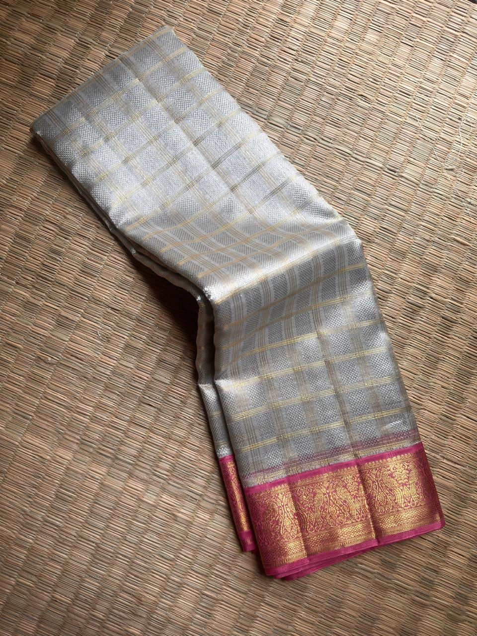 Ivory Kora Organza Pure Silk Kanchipuram Korvai saree.