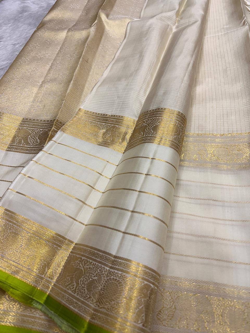 Ivory and Lime Green Handwoven Pure Silk Kanjipuram Saree with Vanasringaram Floral Border