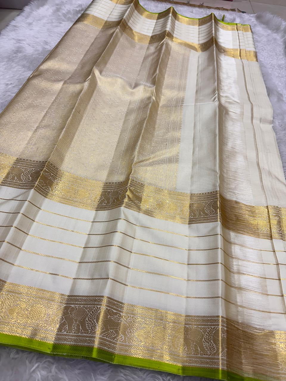 Ivory and Lime Green Handwoven Pure Silk Kanjipuram Saree with Vanasringaram Floral Border