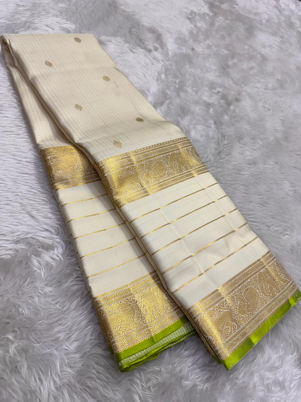 Ivory and Lime Green Handwoven Pure Silk Kanjipuram Saree with Vanasringaram Floral Border