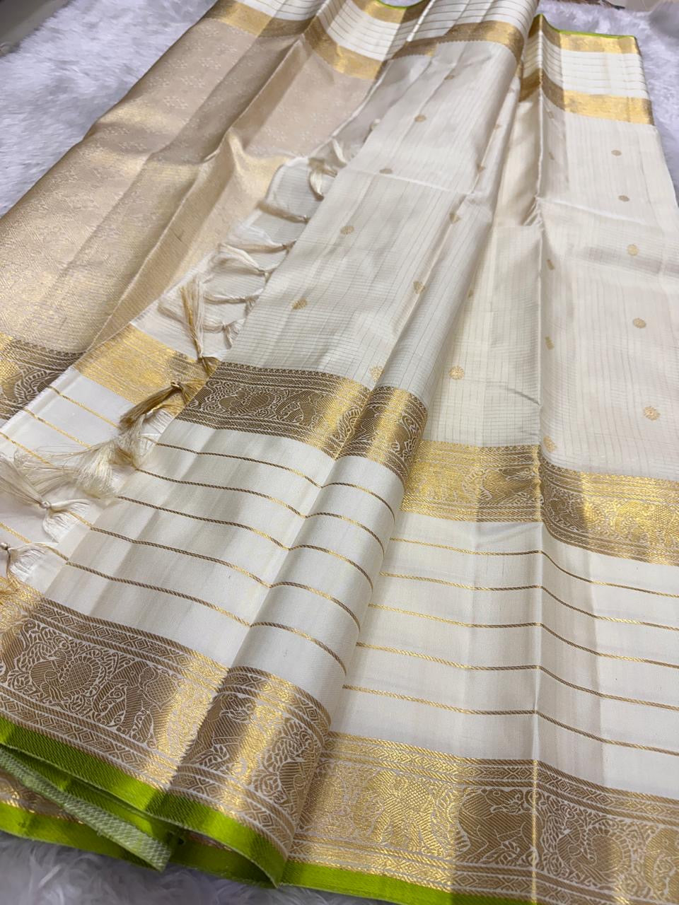 Ivory and Lime Green Handwoven Pure Silk Kanjipuram Saree with Vanasringaram Floral Border