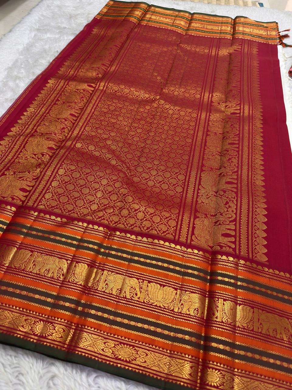 Ivory and Maroon Handwoven Pure Silk Kanjipuram Saree with Maanga Butta and Varisaipet Mubbagam Border