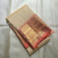 Handwoven Pearl Ivory Pure Silk Kanchipuram showing a soft jasmine-petal ivory body colour.