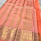 Luminous Pearl Ivory Kanchipuram body scattered with delicate traditional classic-gold zari buttas.