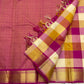 Multicolour Kanchipuram silk saree with large ivory pink lavender rust and gold woven squares.