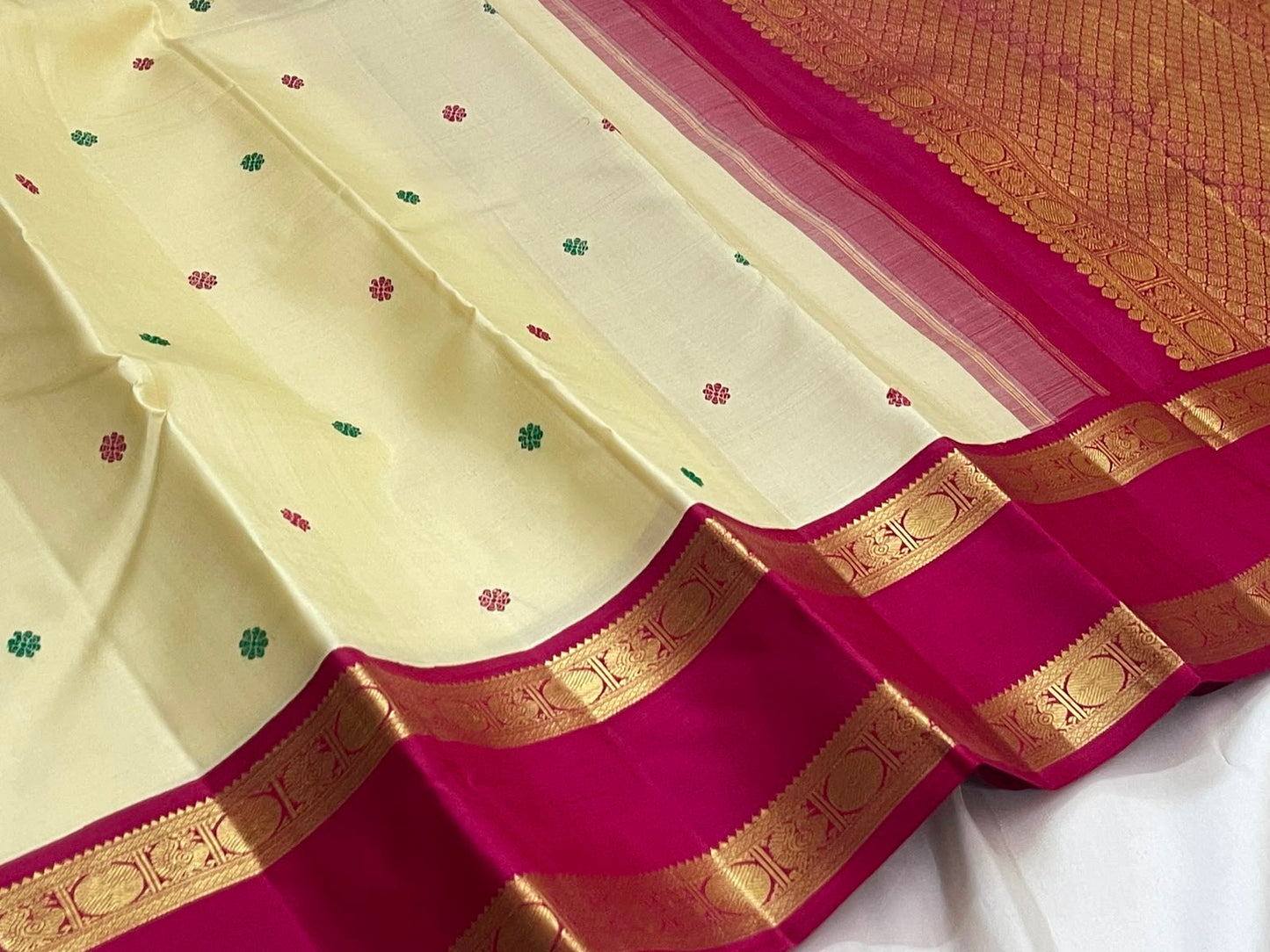 Butter Cream Ivory Handwoven Pure Silk Kancheepuram Rettapet Saree with Raspberry Magenta Zari Border