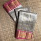 Ivory and Rani Pink Kora Kanjivaram silk Korvai saree.