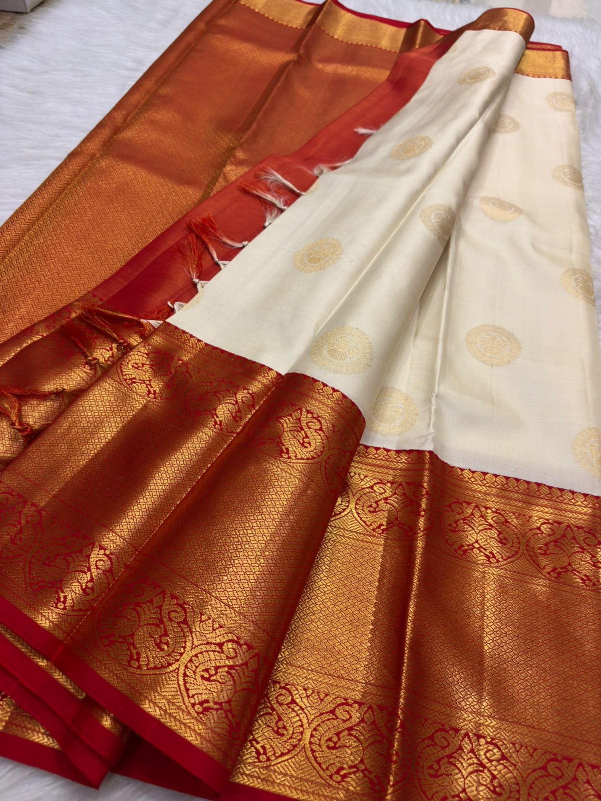 Ivory Handwoven Pure Silk Kancheepuram Korvai Saree with Pillar-Box Red Gold Zari Border