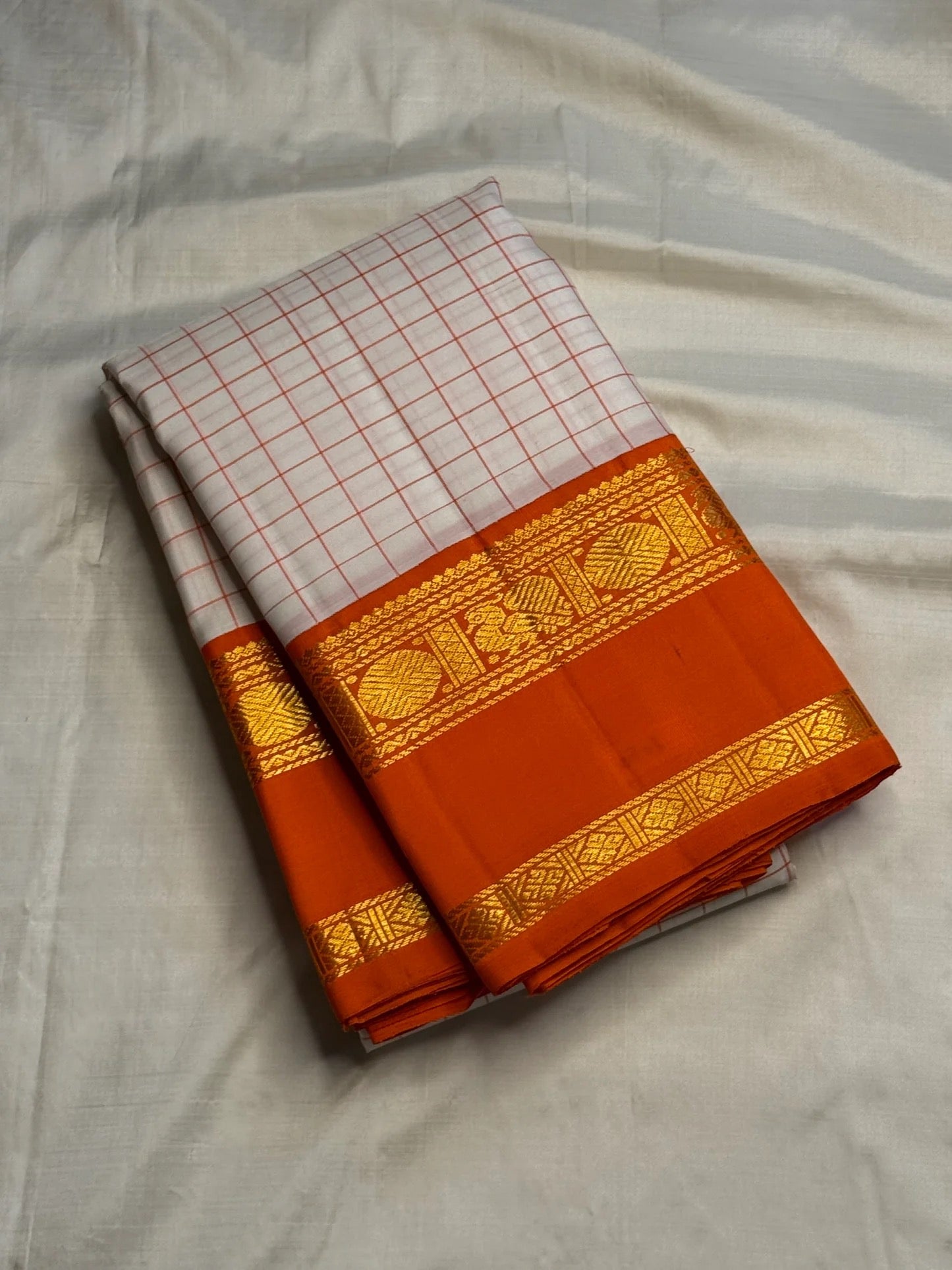 Ivory Kanchi Pattu saree pallu with gold zari medallions and temple motifs