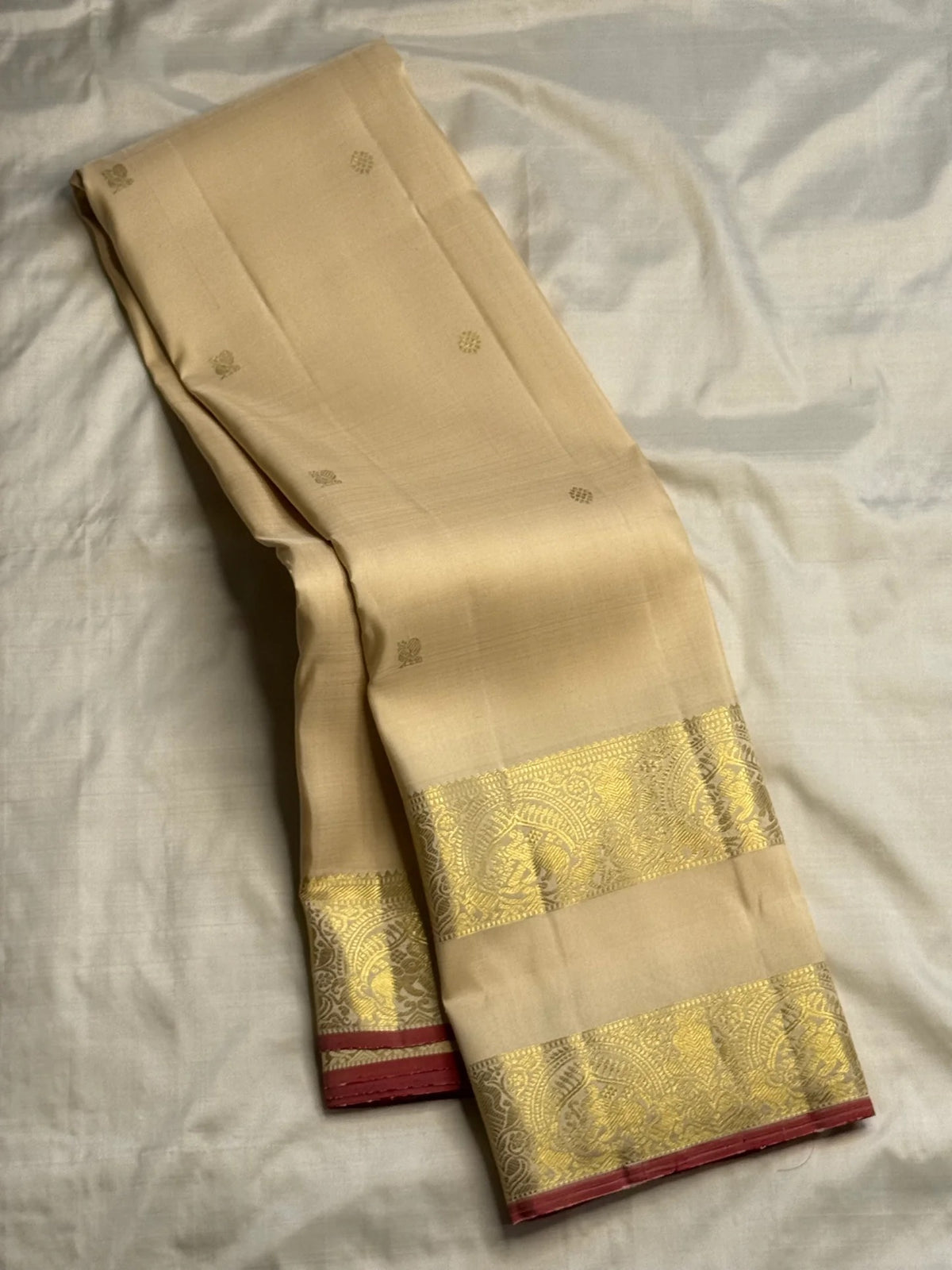 Ivory Pure Silk Kanchipuram Rettapet saree with Deep Pink selvedge.