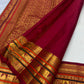 Sevvanthi rust-orange border detail, warm-ivory Kanchipuram Korvai saree