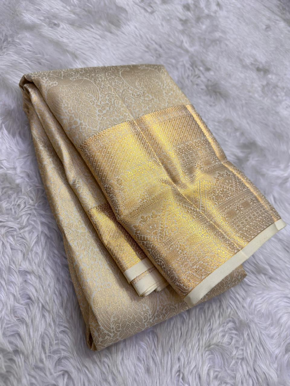 Gandaberunda zari motif detail on ivory tissue silk