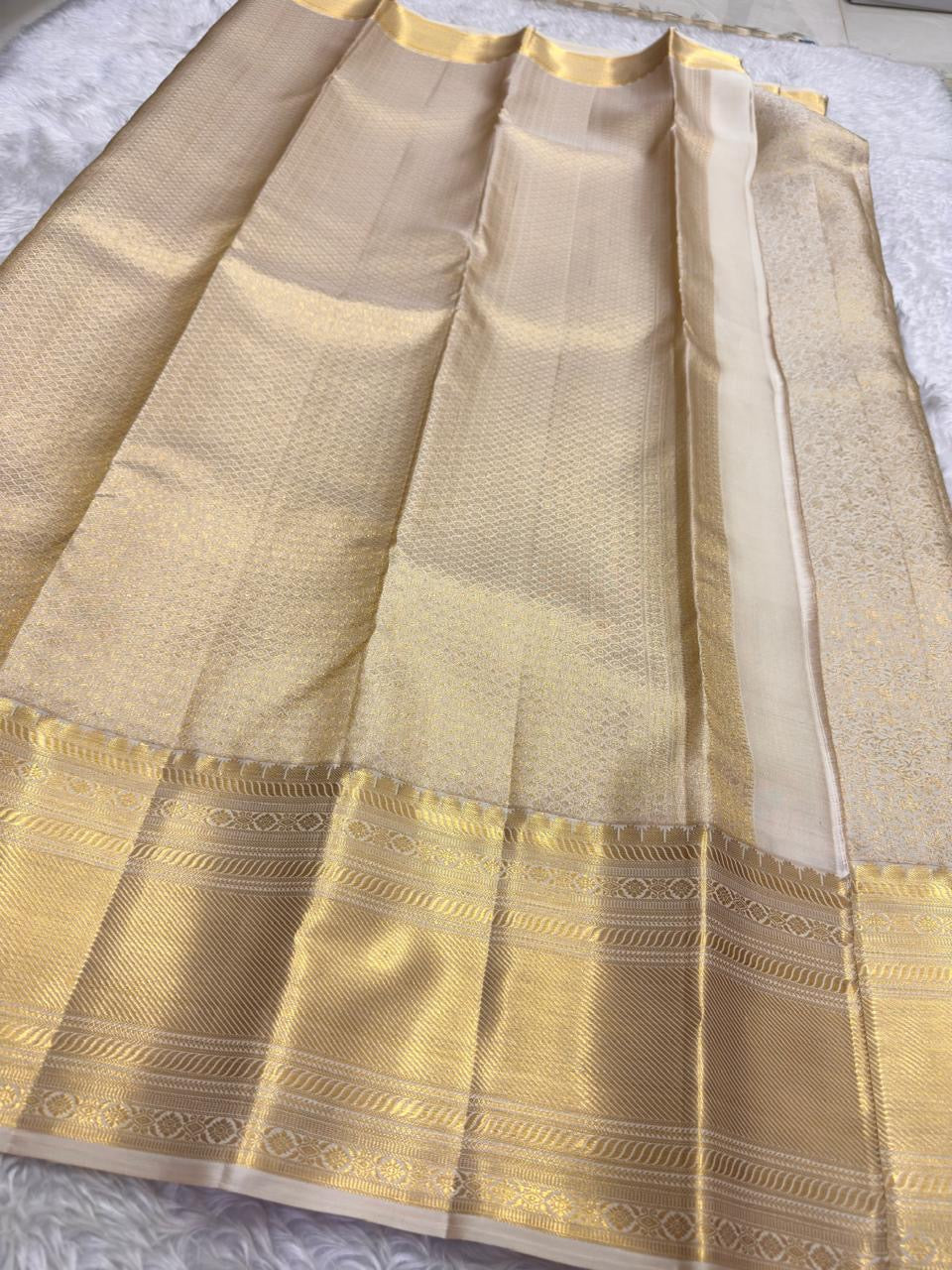 Full drape of champagne tissue pure silk Kanjeevaram saree