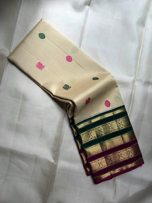 Ivory Handwoven Pure Silk KanchiPattu Saree with Teal and Magenta Varisaipet Border