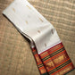 Ivory Kanjivaram silk saree with vermilion red Varisaipet border, close view