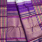 Layered Varisaipet border with traditional pettu work on a white vintage Pure Silk Kanchipuram saree.