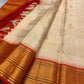 Close view of Zari Kattam body showing Kanchi Kattam stripe grid and Maanga Butta on ivory silk