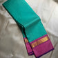 Kanchipattu silk saree in jade green with lily pink border Korvai Kaal Irangiya Border weave traditional zari detail
