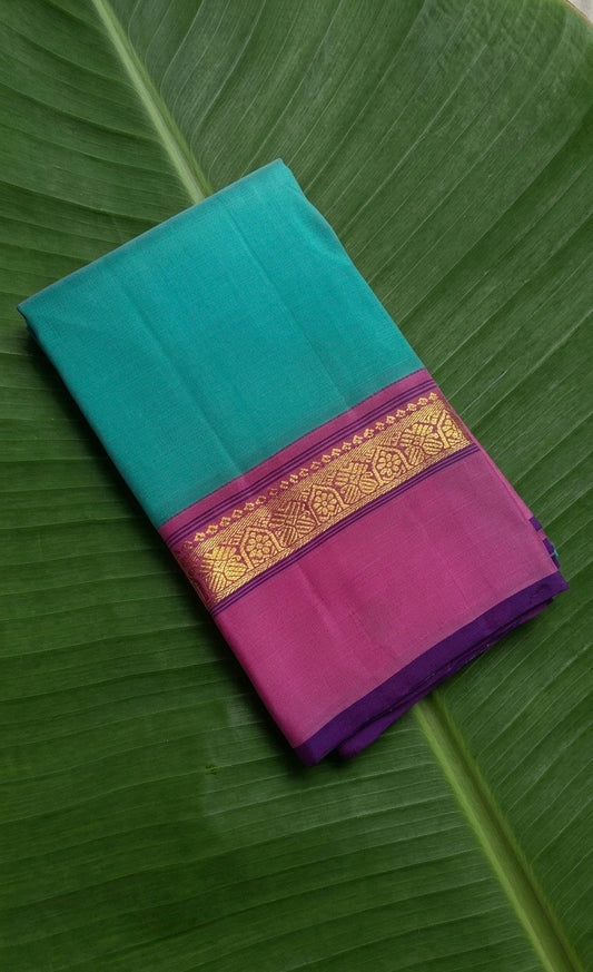 Kanchipuram silk saree in jade green with lily pink border Korvai Kaal Irangiya Border weave folded view