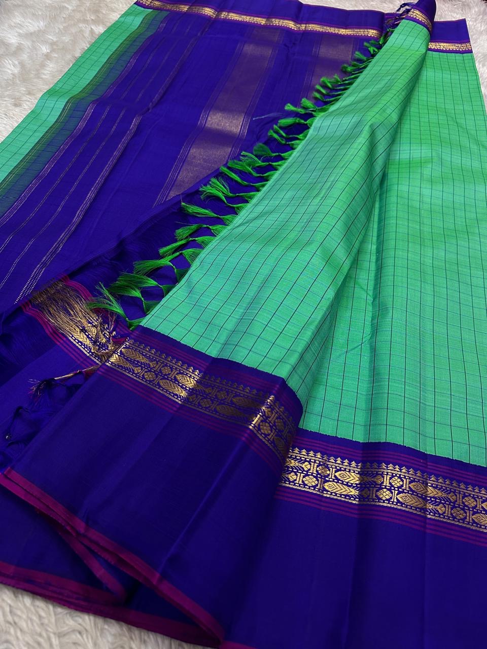 Jade Green and Royal Blue Handwoven Pure Silk Kanjipuram Saree with Kanchi Kattam Kaal Irangiya Border