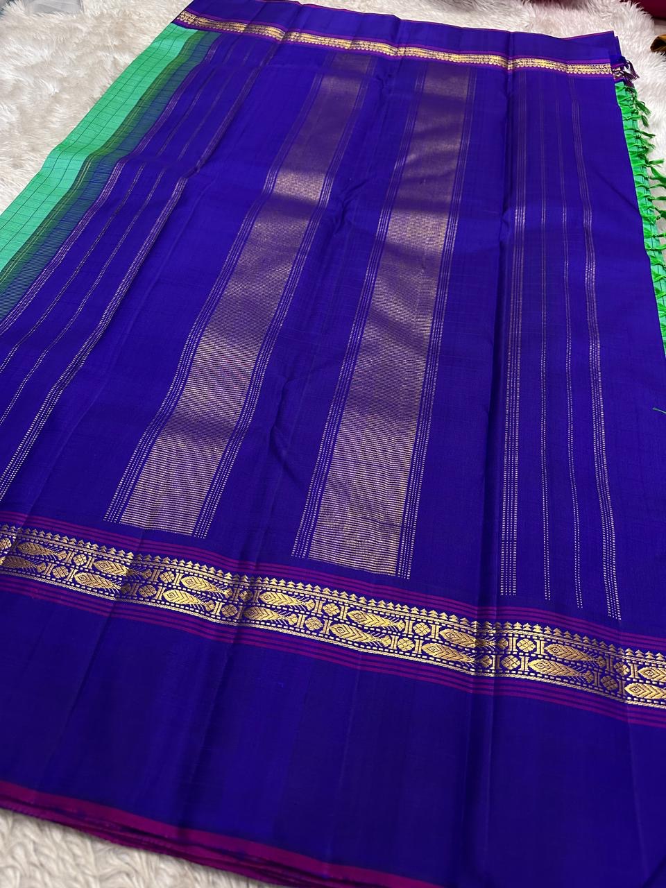 Jade Green and Royal Blue Handwoven Pure Silk Kanjipuram Saree with Kanchi Kattam Kaal Irangiya Border