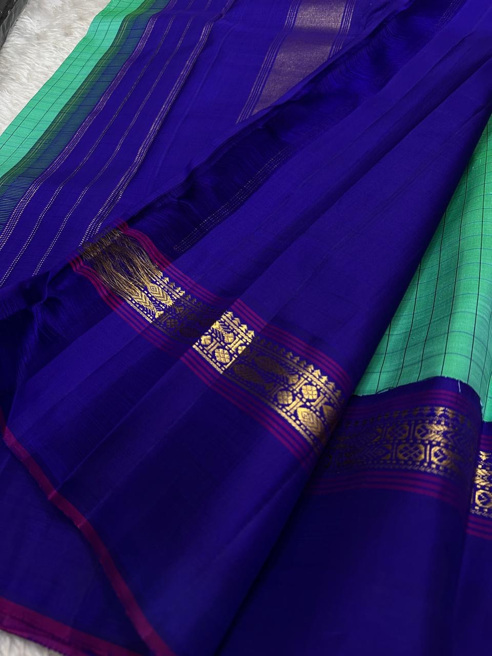 Jade Green and Royal Blue Handwoven Pure Silk Kanjipuram Saree with Kanchi Kattam Kaal Irangiya Border