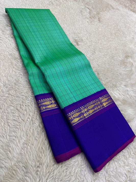 Jade Green and Royal Blue Handwoven Pure Silk Kanjipuram Saree with Kanchi Kattam Kaal Irangiya Border